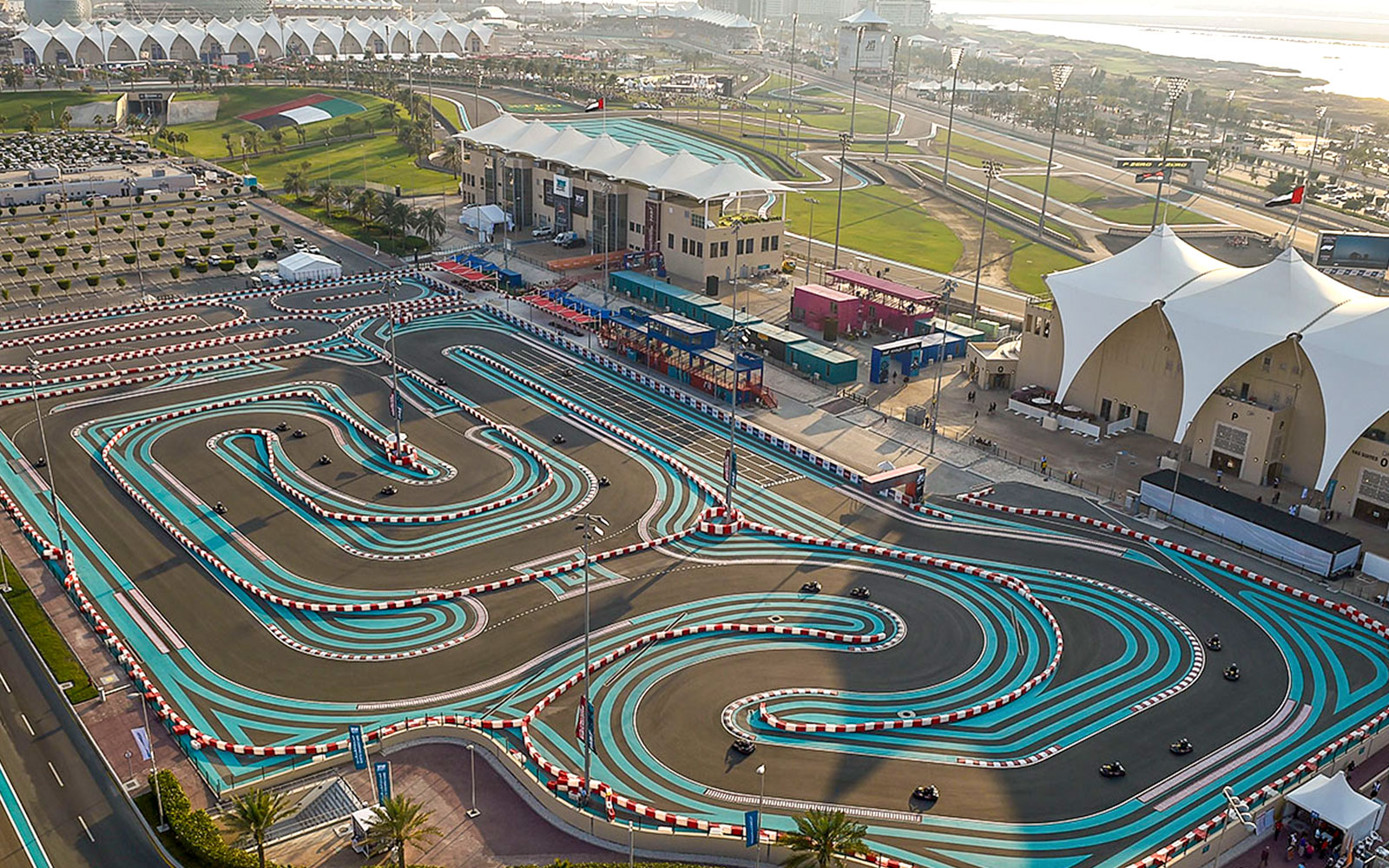 https://fasteagletravelandtoursim.com/wp-content/uploads/2025/05/34d32cfecc101356423fcf09fb61d053-Yas-Marina-Circuit-Hero-1.jpg