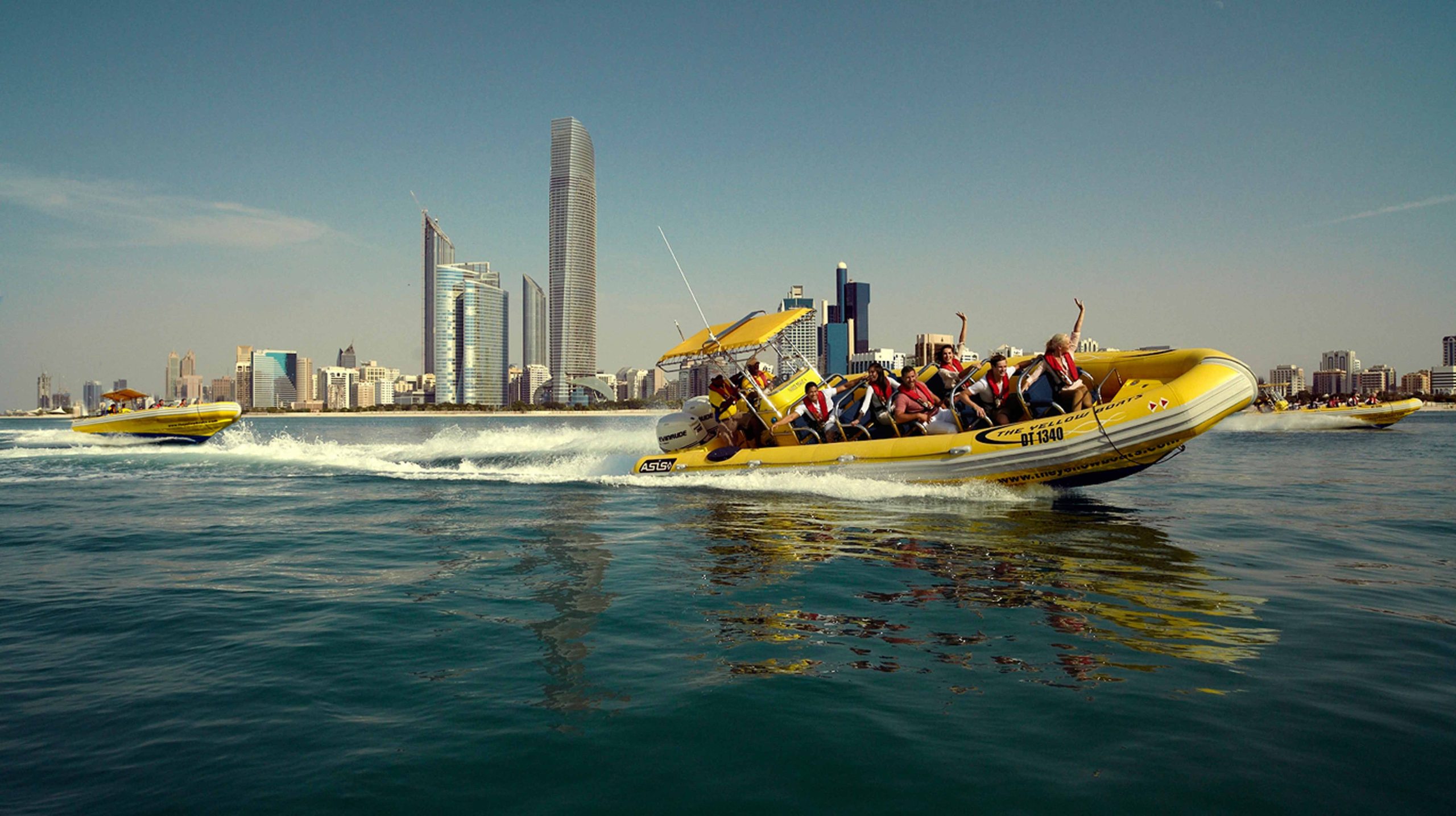 https://fasteagletravelandtoursim.com/wp-content/uploads/2025/05/yellow-boats-main-image-5000x2800-1-scaled.jpg